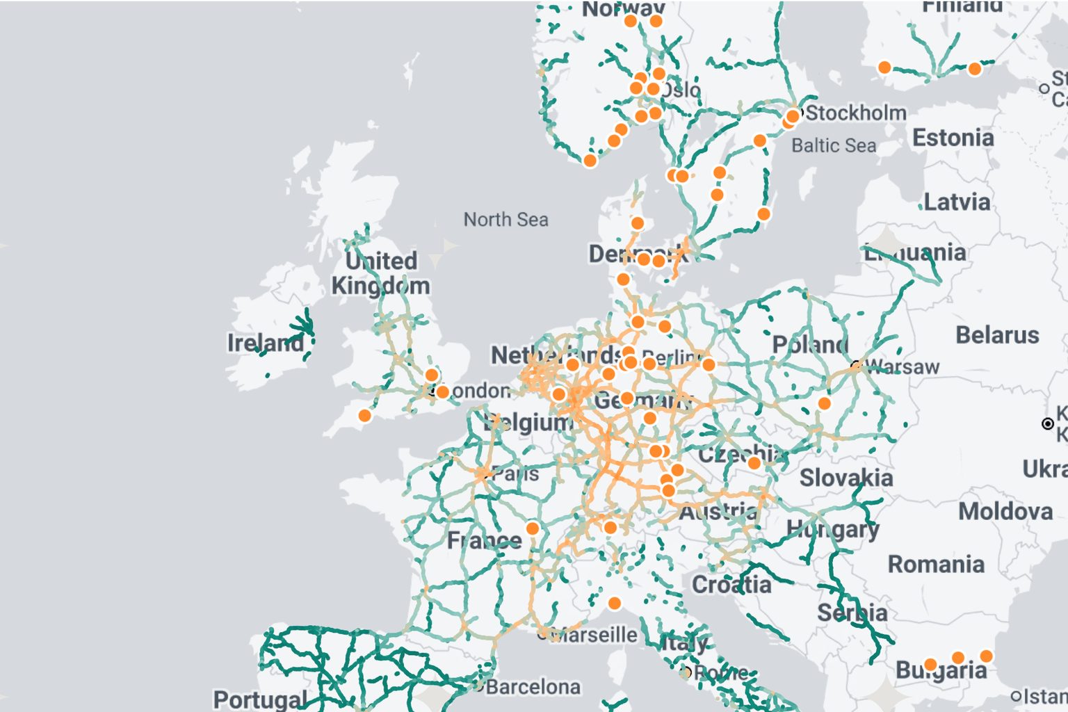 Map of Europe's motorways coloured by electric truck break-charging demand in 2030, with today's truck charging sites as orange dots